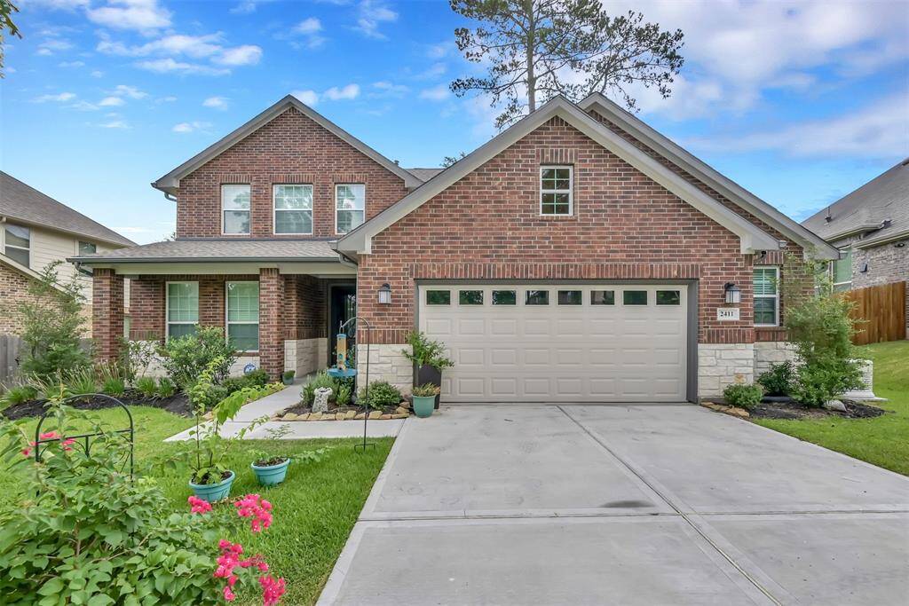 Beautiful brick and stone home nestled in the master planned community of Graystone Hills.