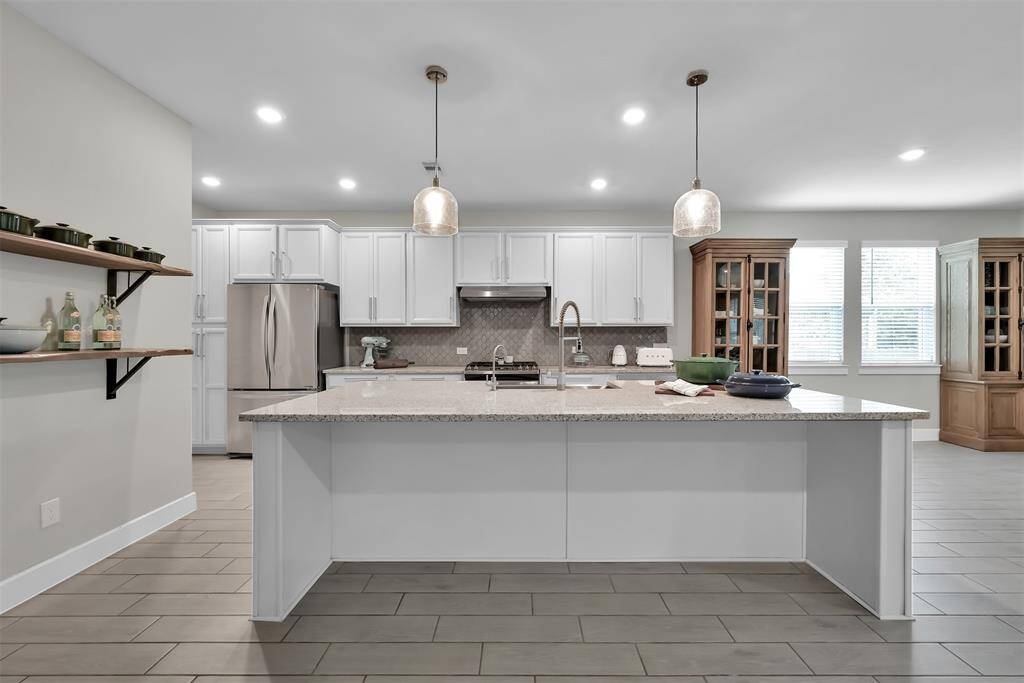 Pendant lights bring a touch of elegance to the space