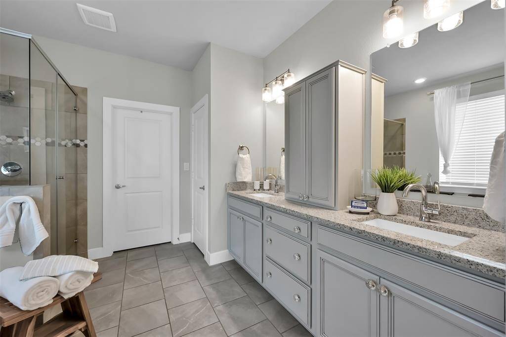Dual sinks and ample storage space.