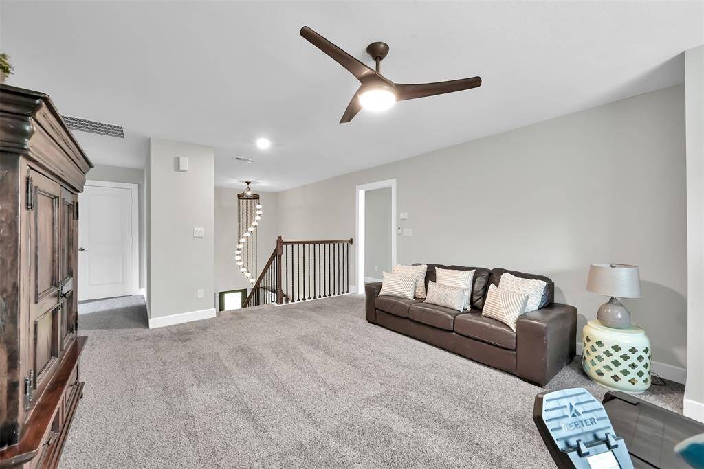 Expansive second-floor game room perfect for entertainment.