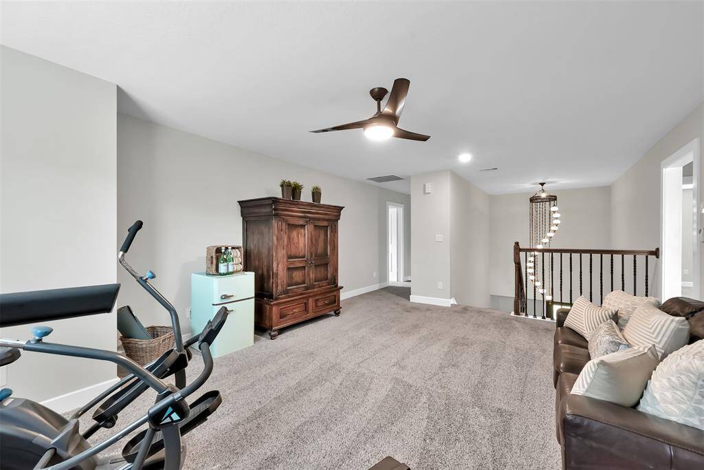 Expansive second-floor game room perfect for entertainment.