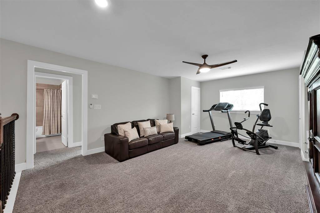 Expansive second-floor game room perfect for entertainment.