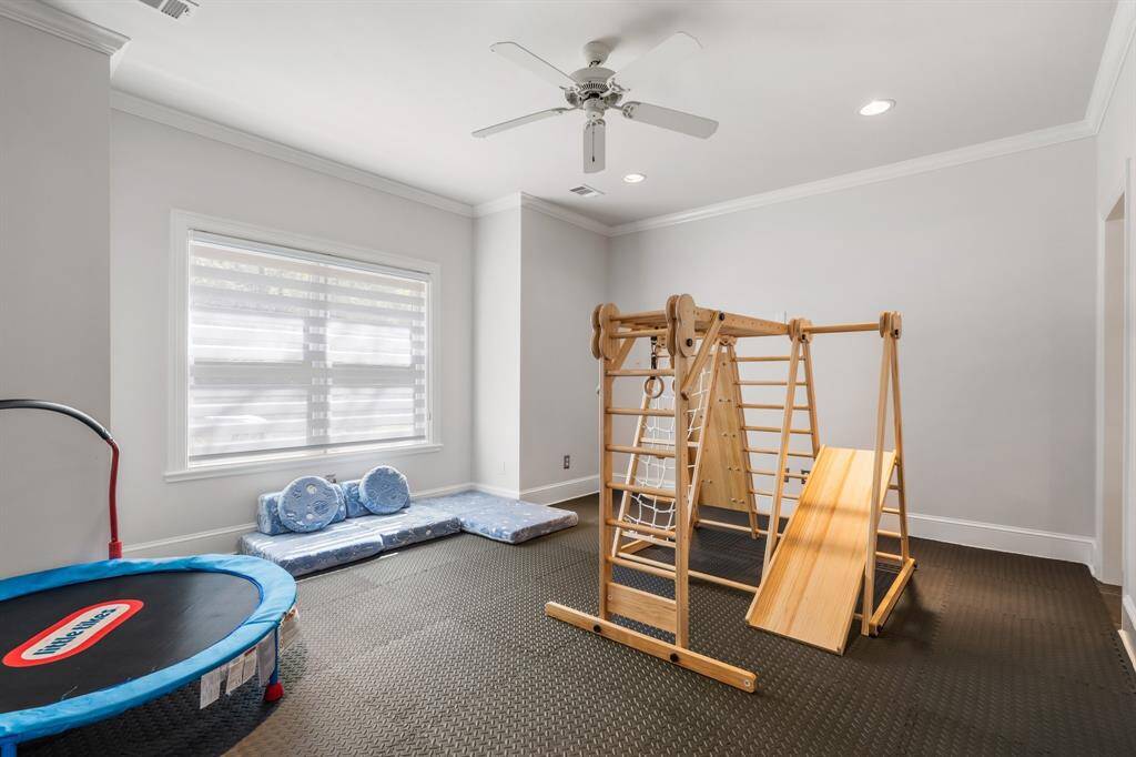 The ground floor oversized secondary bedroom is ready to be a home gym or indoor playground! Swap out the flooring and it's a private guest suite or perfect for a roommate.