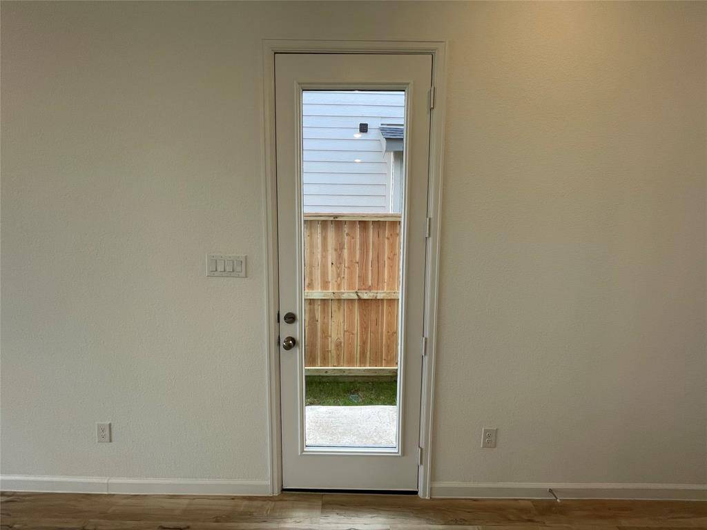 Direct access to the backyard from the living area.