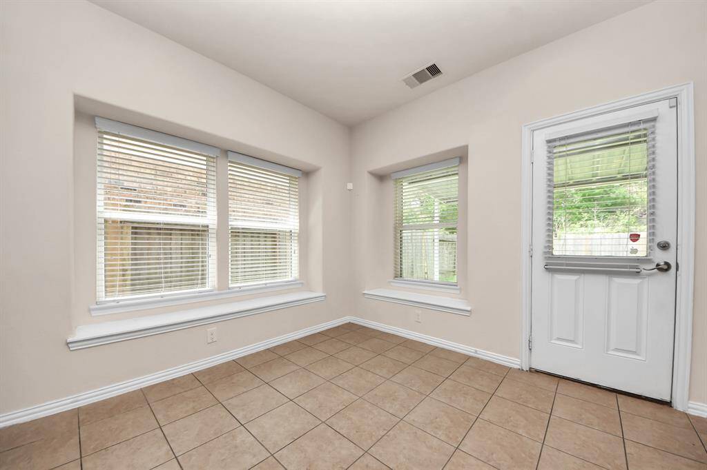 Breakfast area surrounded by windows