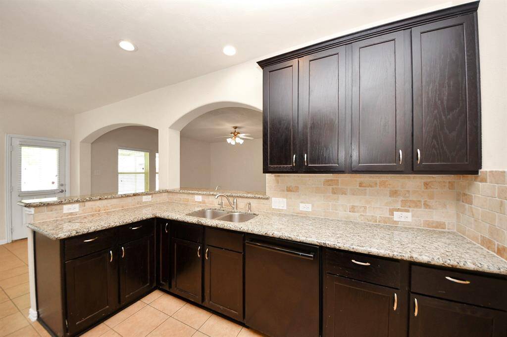 Granite counters with a convenient breakfast bar