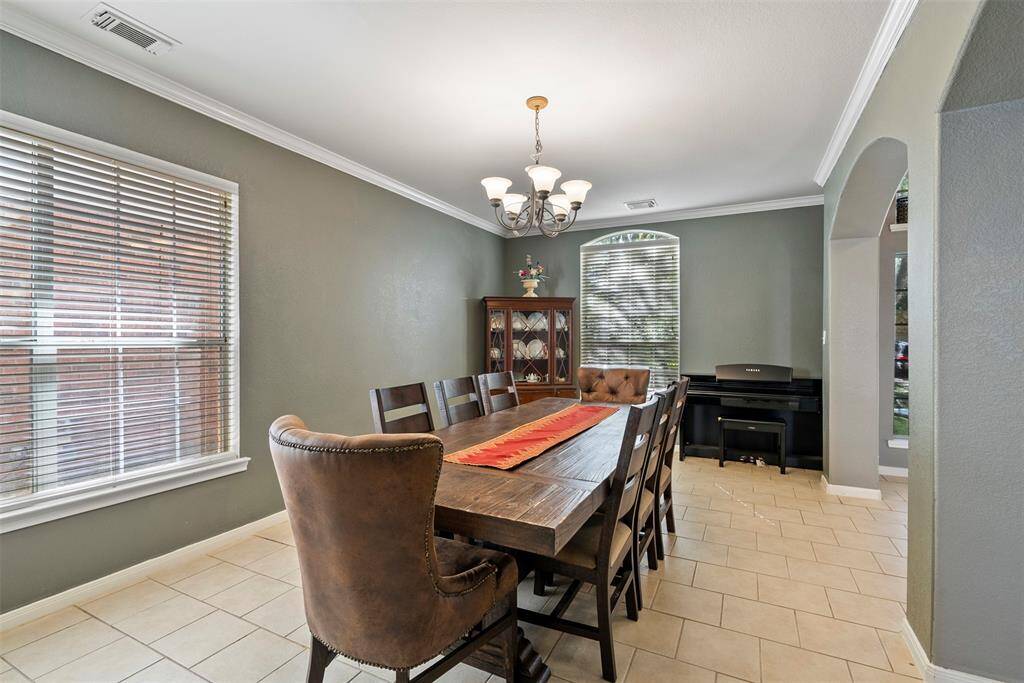 The formal dining room has plenty of room for a grand table and holiday celebrations
