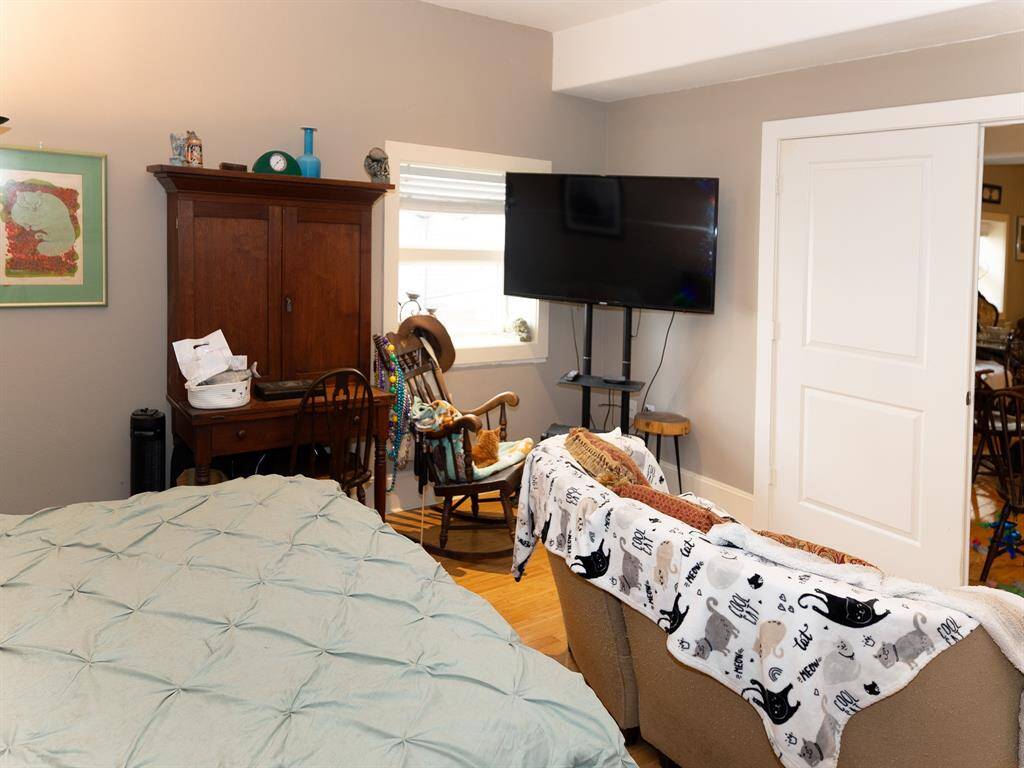Double door entry into the bedroom off living room