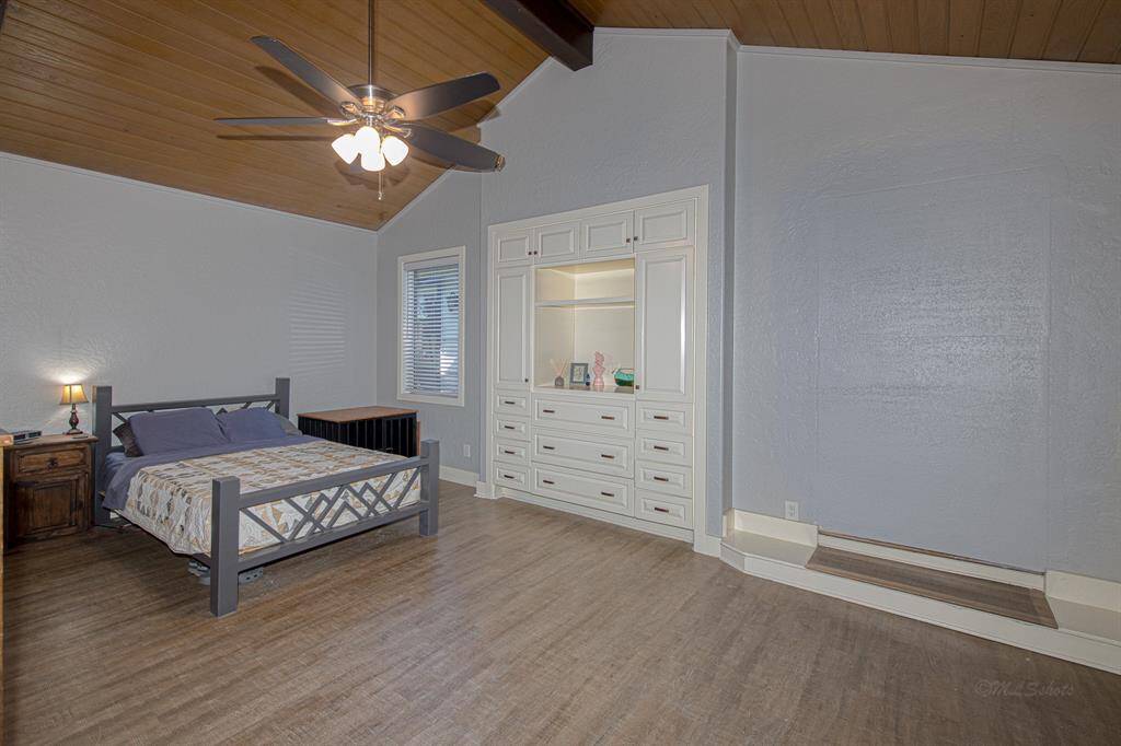 Primary suite with sitting area and built-ins