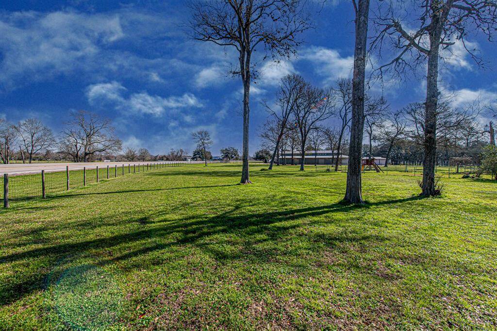 View of the land and the main road that runs in front of the home