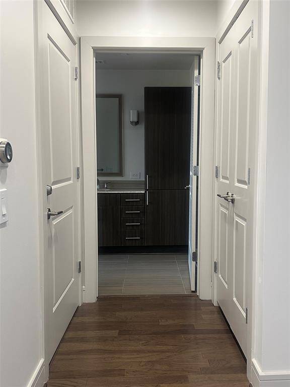Hallway to restroom - washer on right side