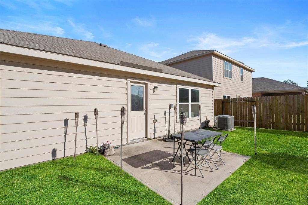 The patio is generously sized, providing ample space for various outdoor activities.