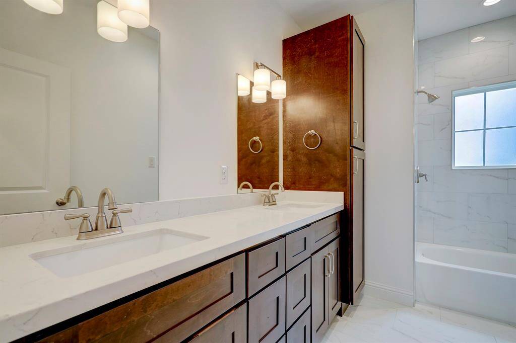 Upstairs features 3 secondary bedrooms, each with oversized windows, walk-in closets, and fully furnished for your comfort.