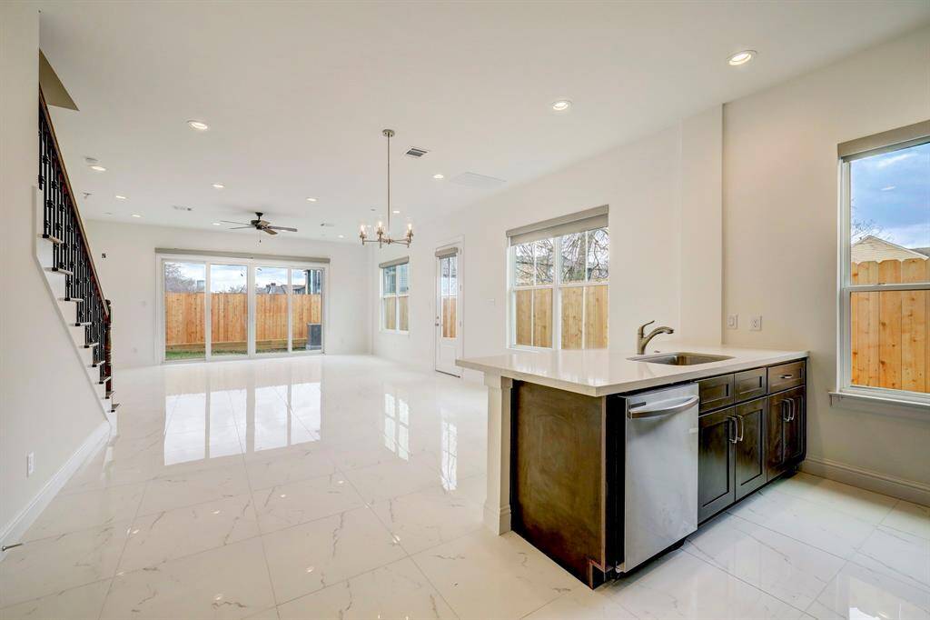 Flooded with natural sunlight, this first floor features plenty of windows and sliding doors that open seamlessly to the backyard. Downstairs will be fully furnished for your convenience.