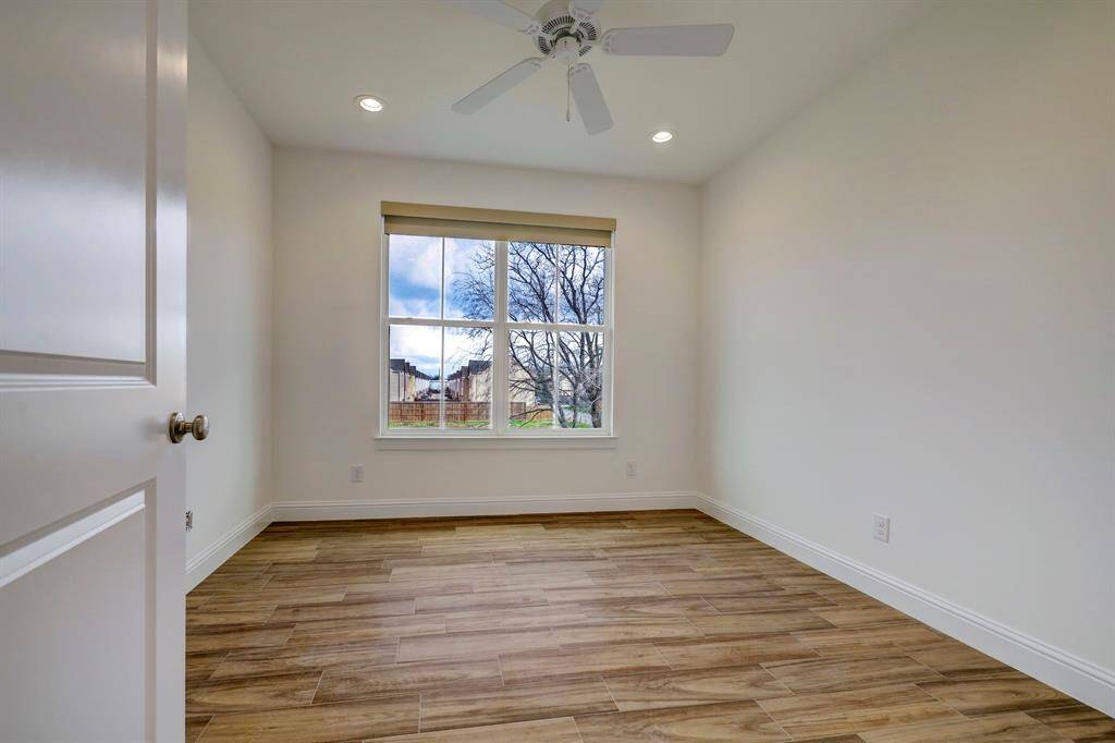 Upstairs features 3 secondary bedrooms, each with oversized windows, walk-in closets, and fully furnished for your comfort.