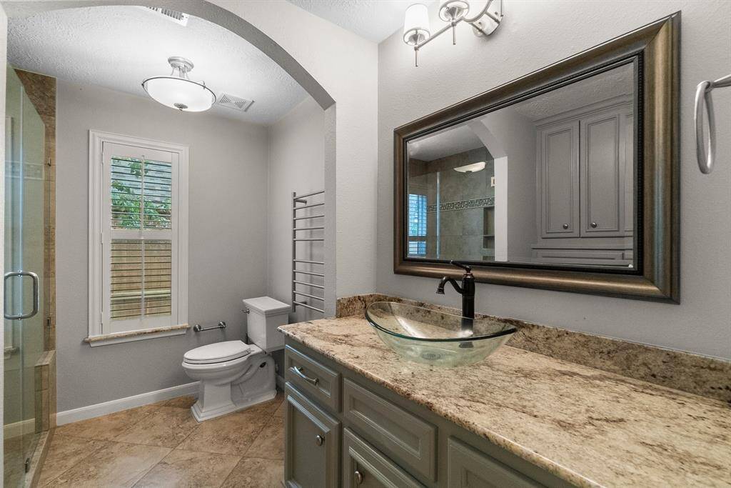 Check out the secondary bath with granite