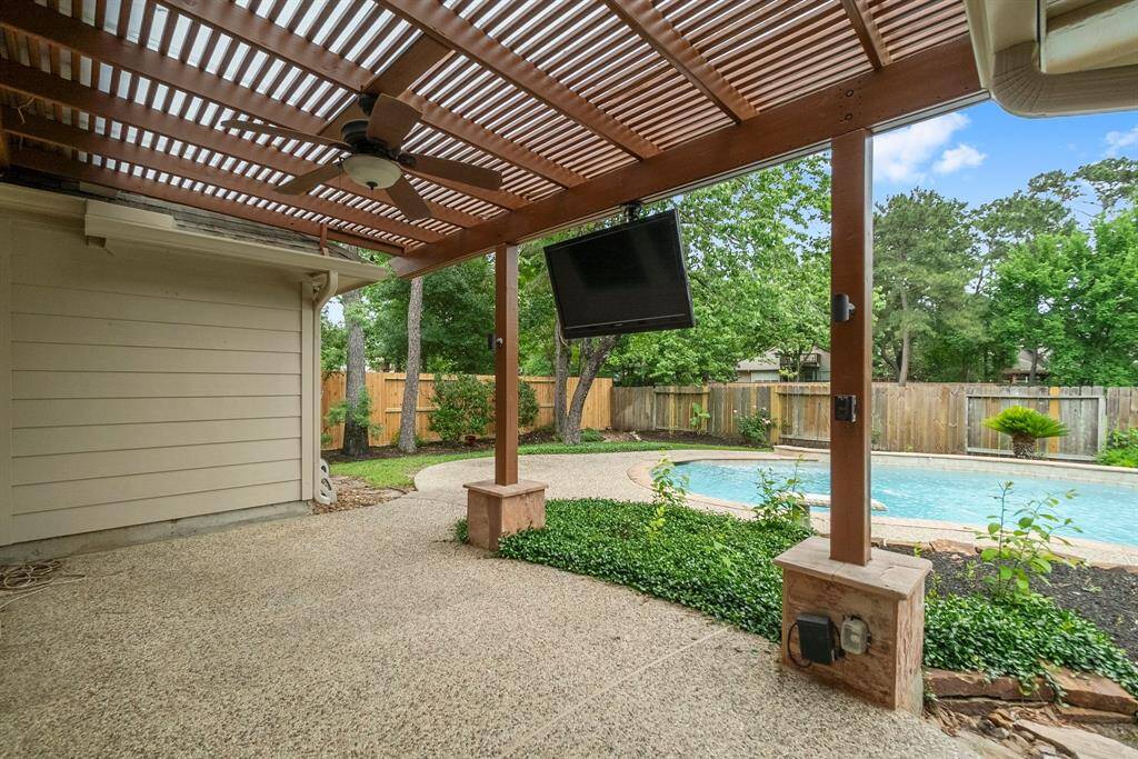 Covered arbor over looking private backyard