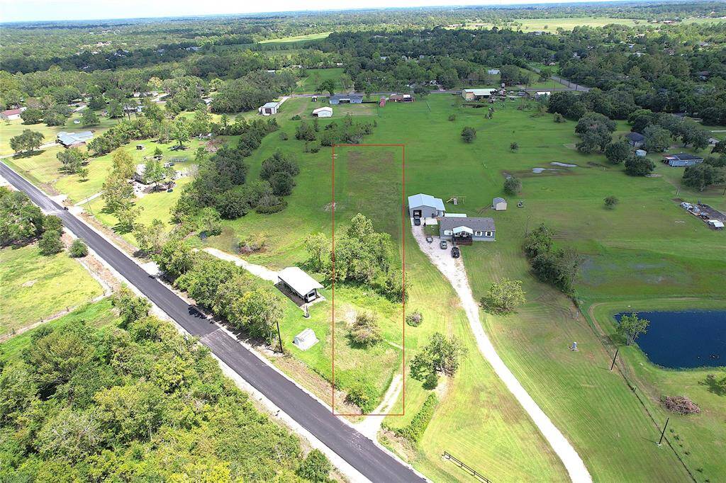 Photo has estimated property lines.