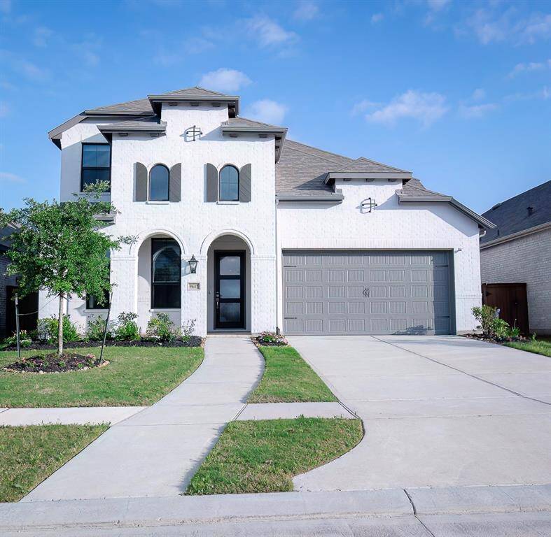 Stunning lakefront home in a serene cul-de-sac setting.