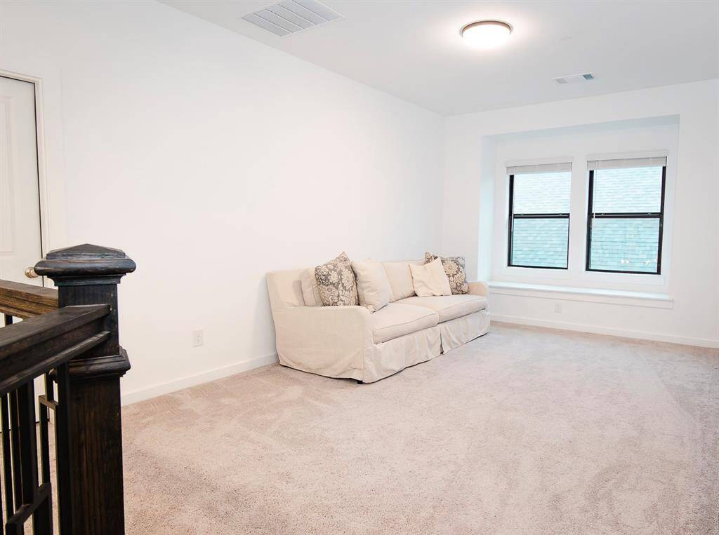 Spacious upstairs retreat perfect for relaxation or entertainment.