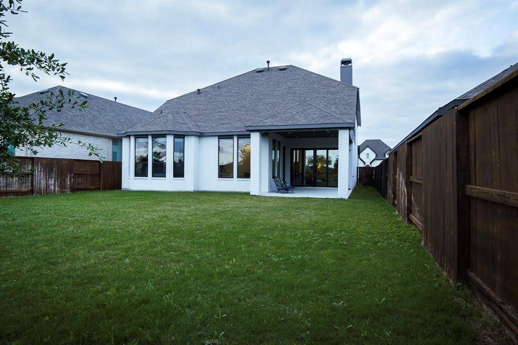 Inviting access to a spacious back patio.