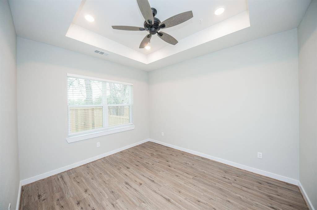 Primary bedroom with natural light