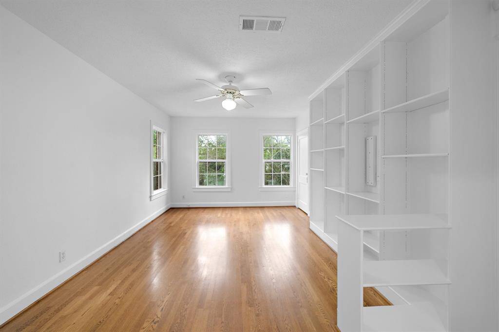 Freshly painted upstairs unit. This is the living room.