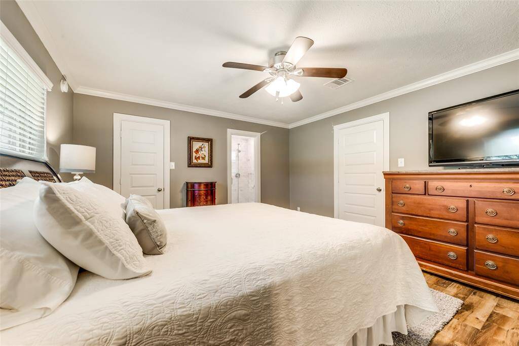 The door to the private bathroom and walk-in closet can be seen here, your own personal getaway!