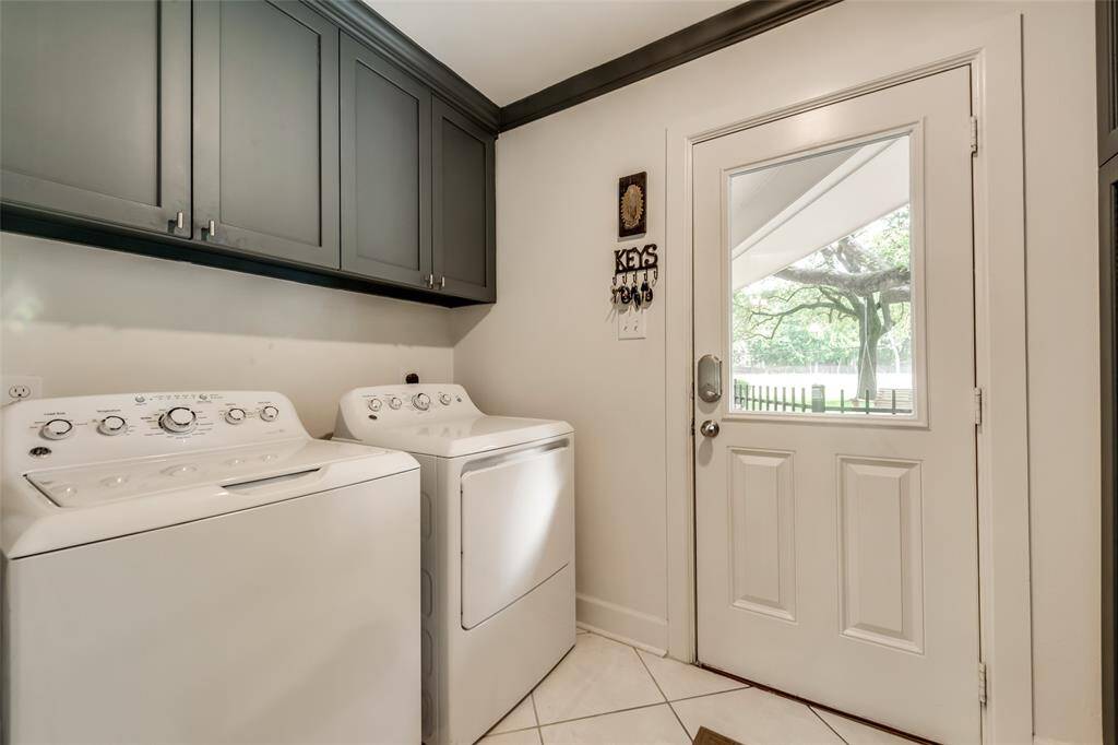 The utility room off the breakfast nook opens onto the back patio and offers more storage.