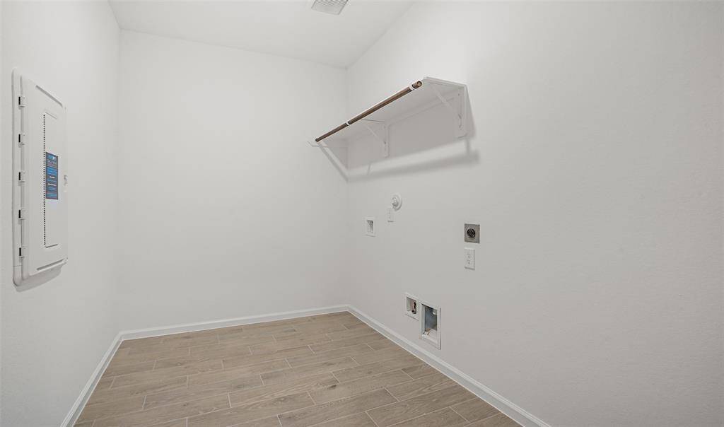 Laundry room (*Photo not of actual home and used for illustration purposes only.)
