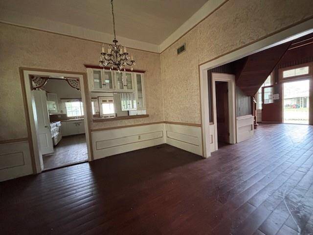 Off the entry, living room and kitchen is a grand dining room