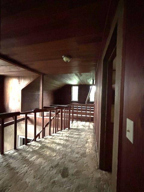 This cute landing has a view of the entry and living area