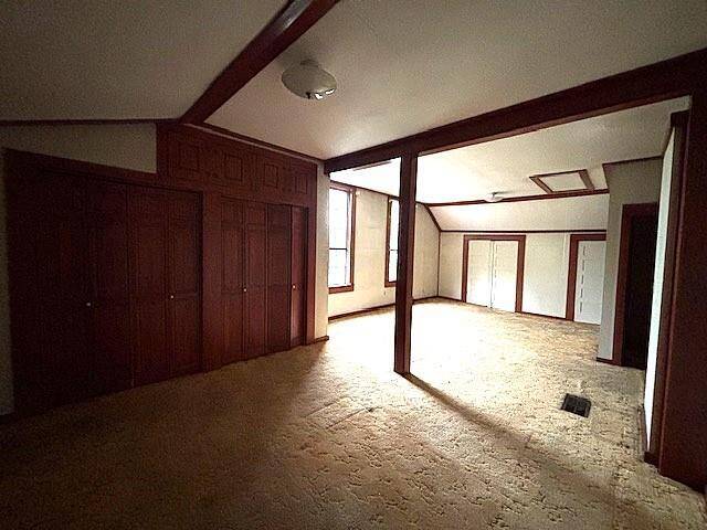 Another view of the bedroom and sitting area
