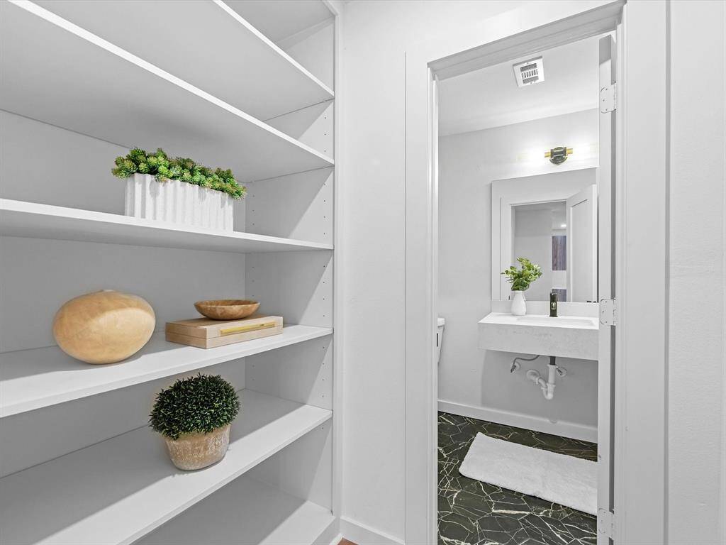 Shelving for additional storage off the living/kitchen area.