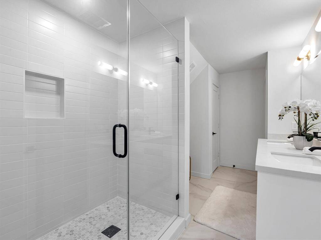 Ensuite bathroom for secondary/upstairs primary room.