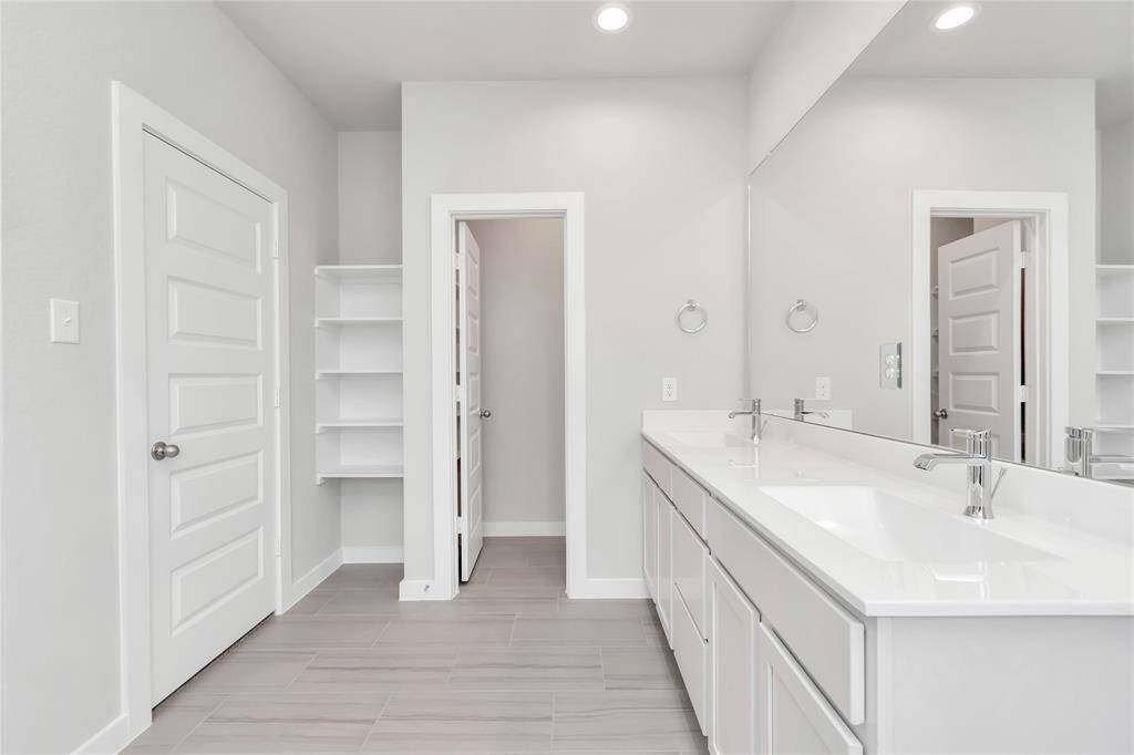 Sample photo of completed home with similar floor plan. As-built interior colors and selections may vary