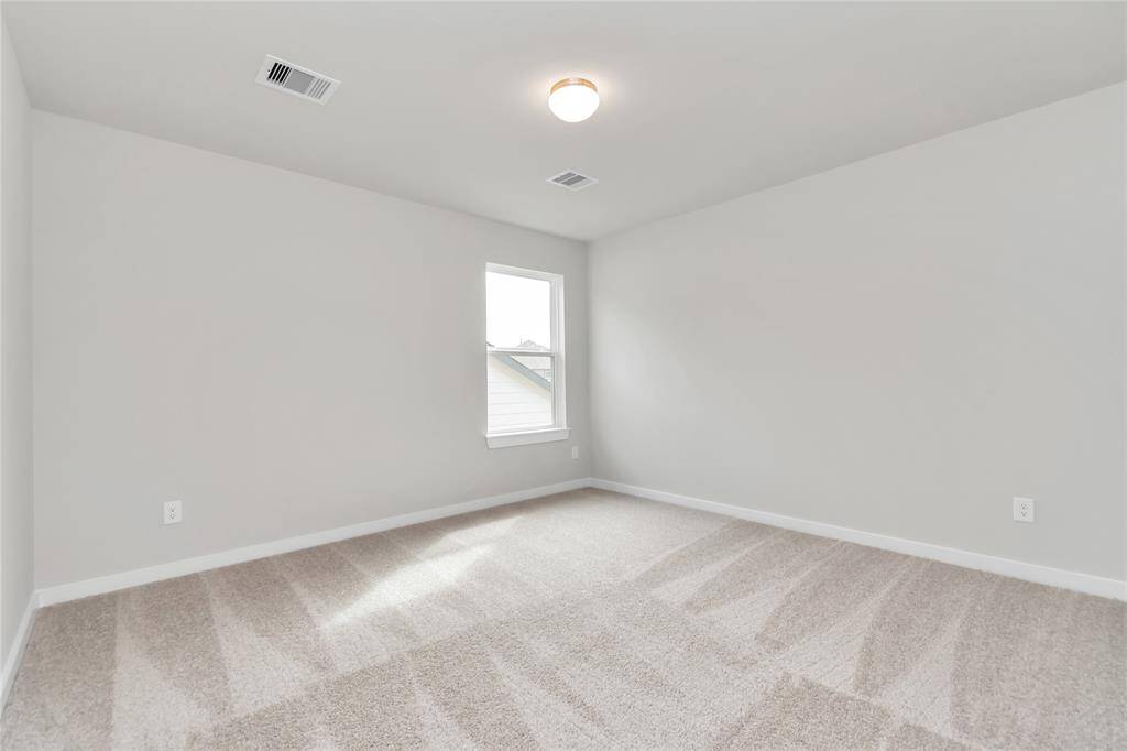 Sample photo of completed home with similar floor plan. As-built interior colors and selections may vary
