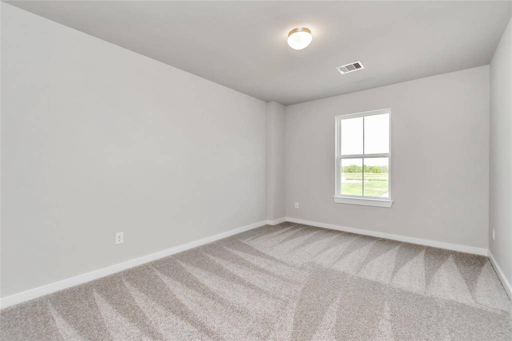 Sample photo of completed home with similar floor plan. As-built interior colors and selections may vary