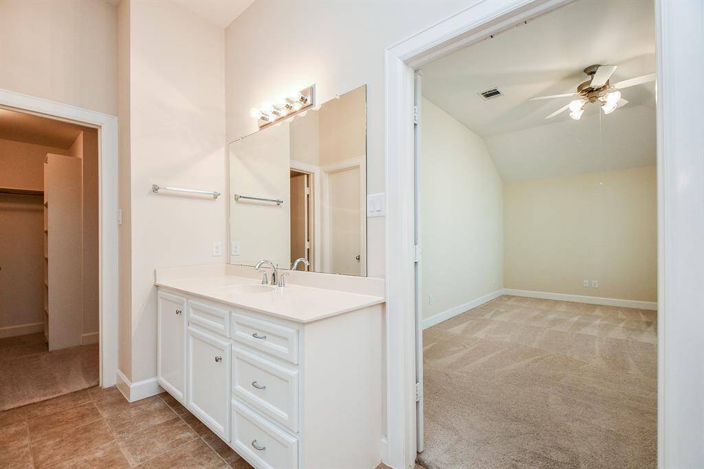 The transition from bedroom to luxurious bath is seamless!