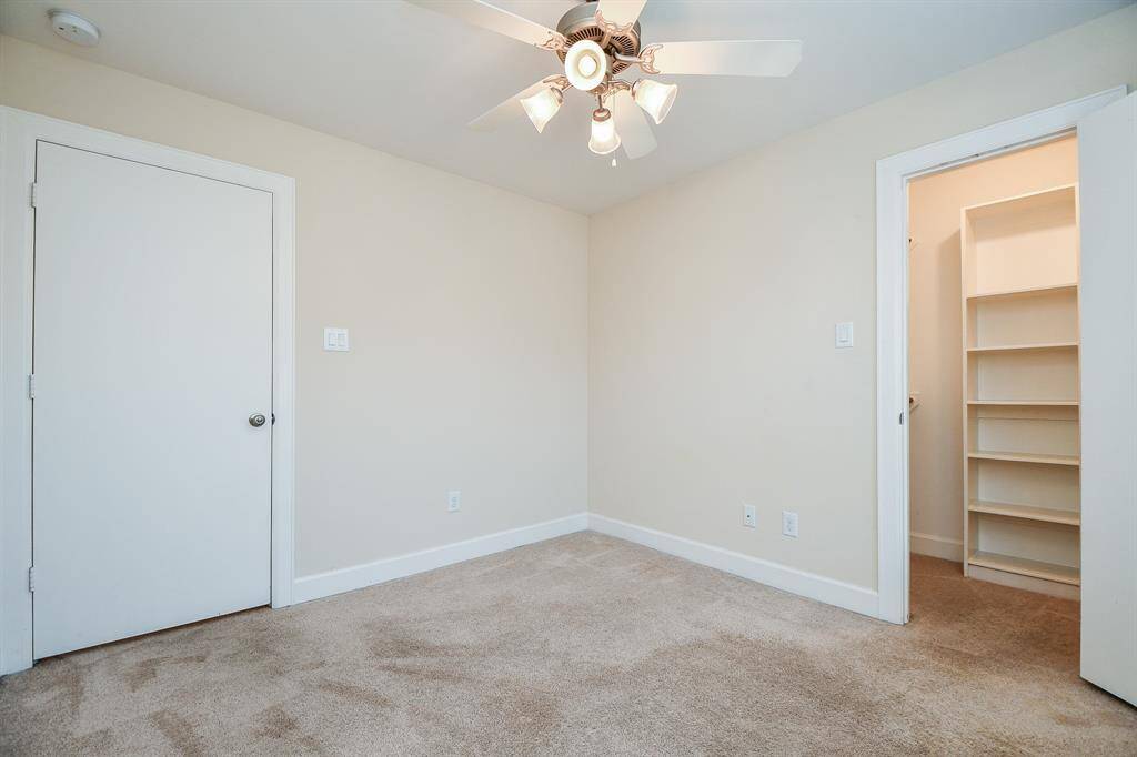 Here's another generous walk-in closet in a secondary bedroom.