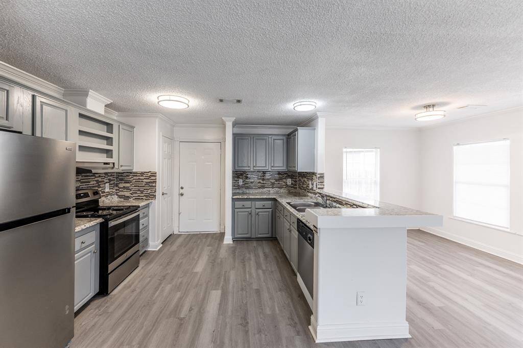 Photos show typical layout and finishes; actual unit may vary.