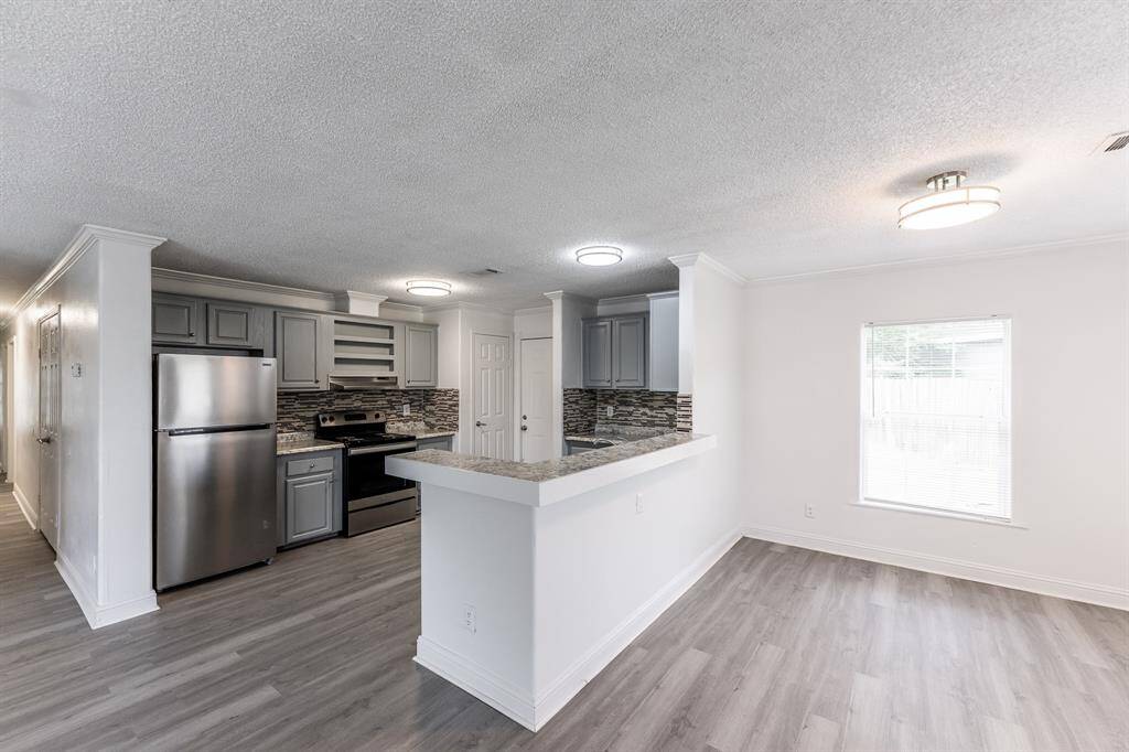Photos show typical layout and finishes; actual unit may vary.