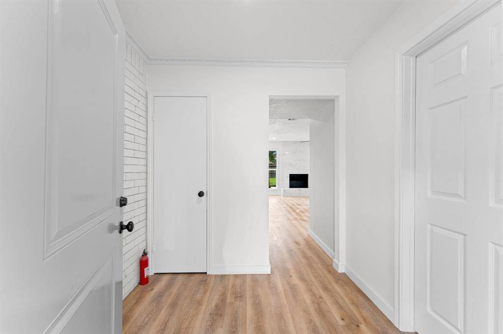 Welcome in! Check out the beautiful flooring and great entry space ready for your creative decor with a convenient coat closet! The additional room is located immediately to the right of this entrance and pictured in the next photo