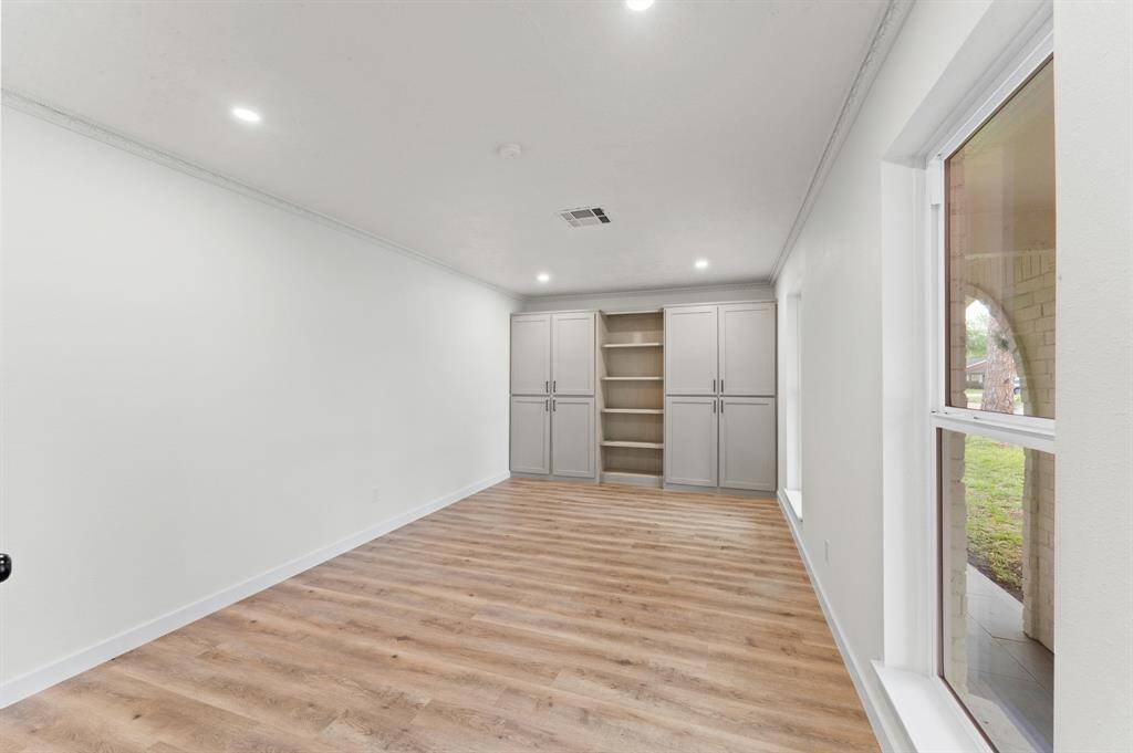Office space / Additional bedroom / lounge area you name it! Such a large space with brand new built in cabinets!