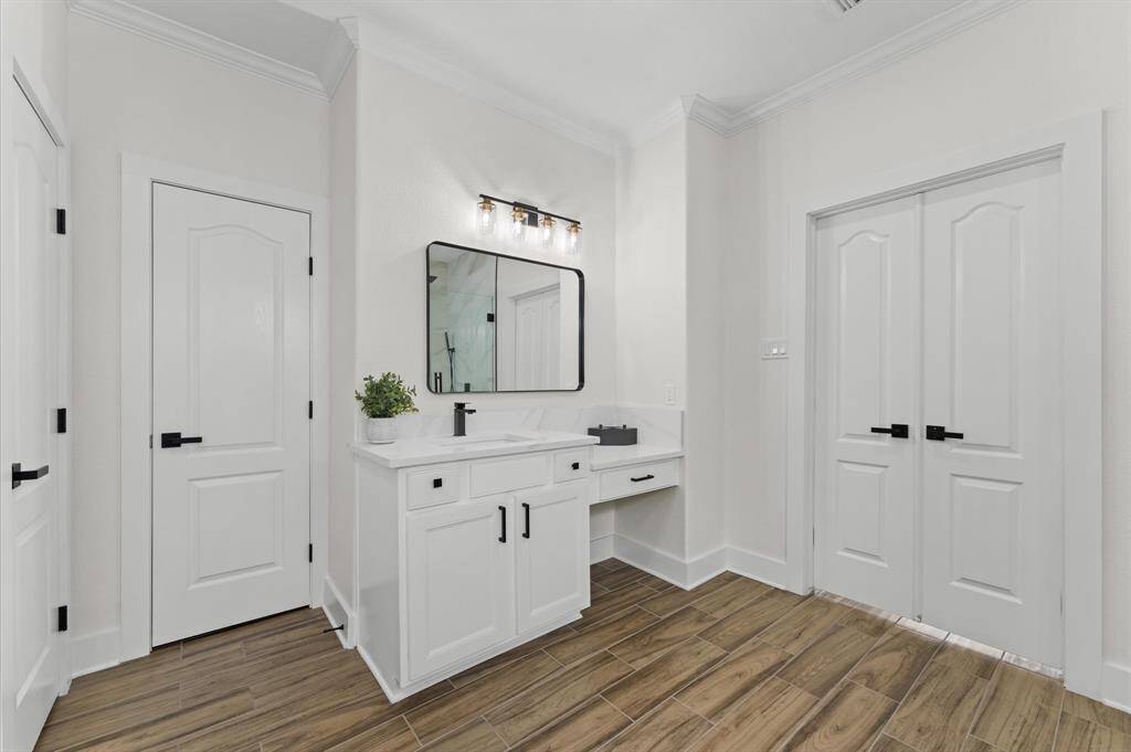 Spacious and inviting family room with a gas fireplace, oversized windows, new light fixtures and fresh paint.Living Room –