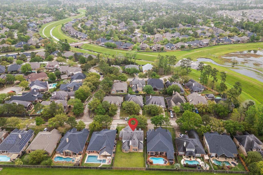 Expansive outdoor area with lush landscaping, no back neighbors, and plenty of space for outdoor entertaining.