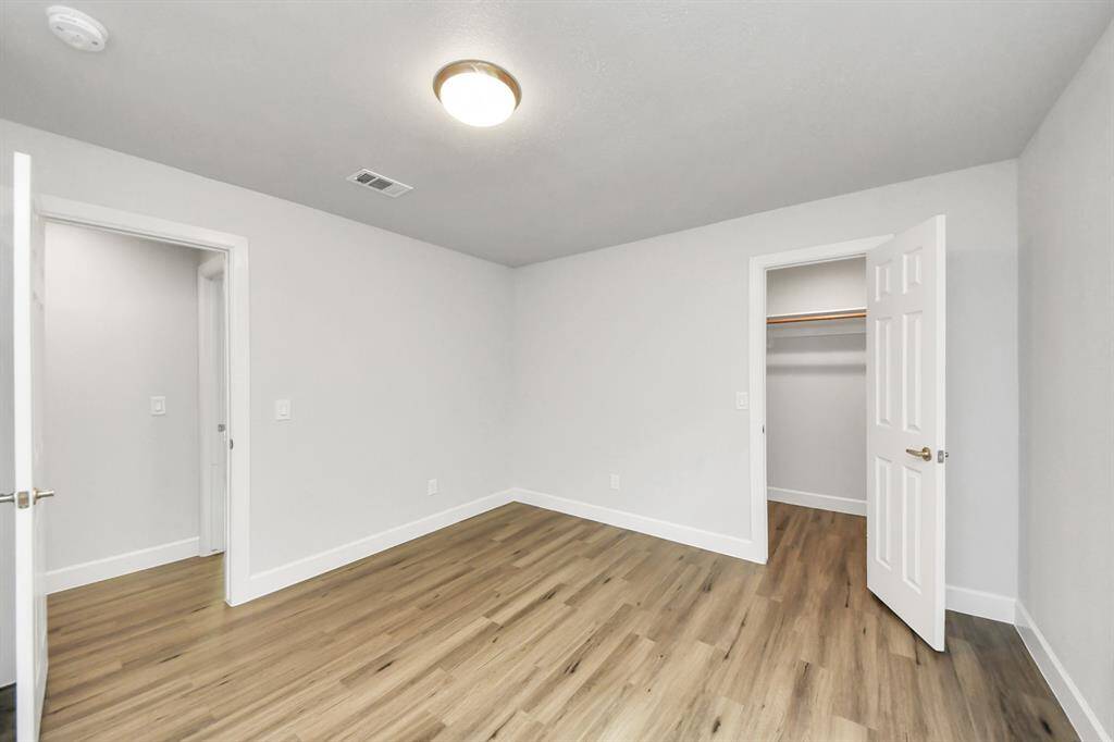 Bedroom # 3, used as a study/office for the previous homeowner, but is definitely a bedroom with a full size closet