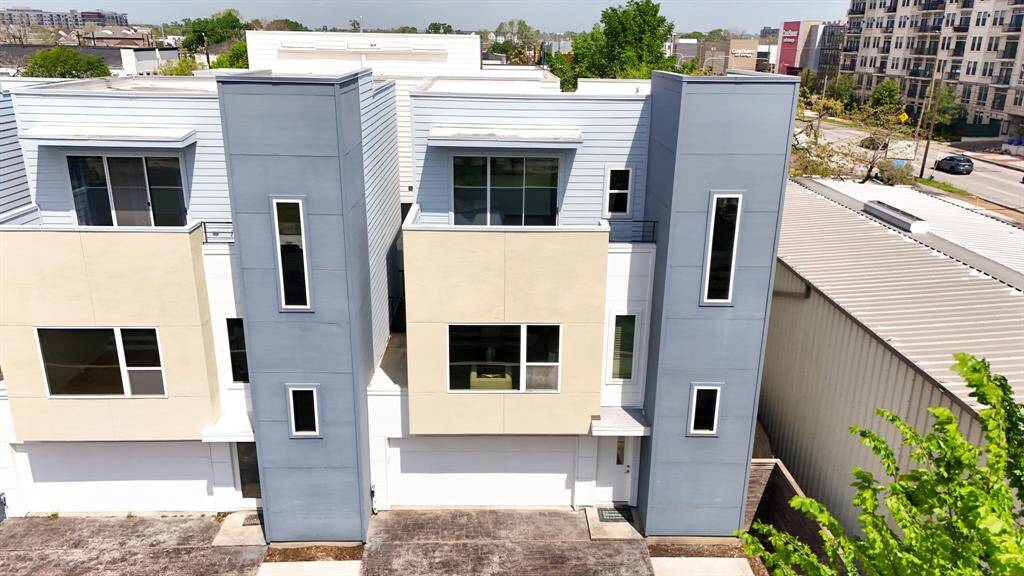 This sleek three-story home offers modern architecture and an unbeatable location close to everything the city has to offer.