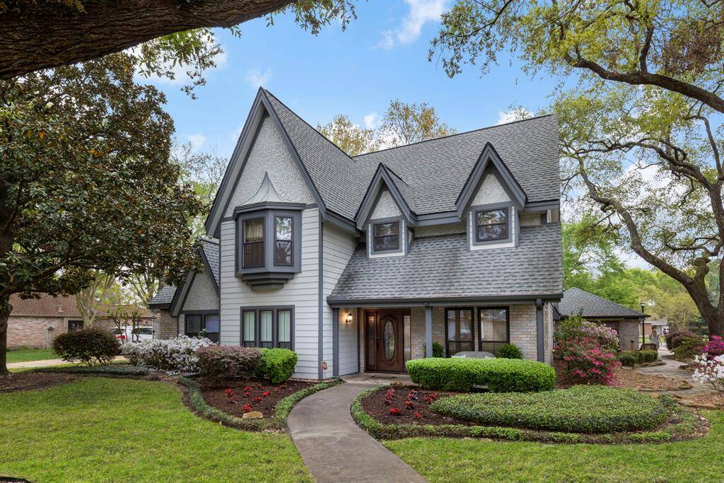 Corner lot with mature trees in prestigious neighborhood of Jersey Village