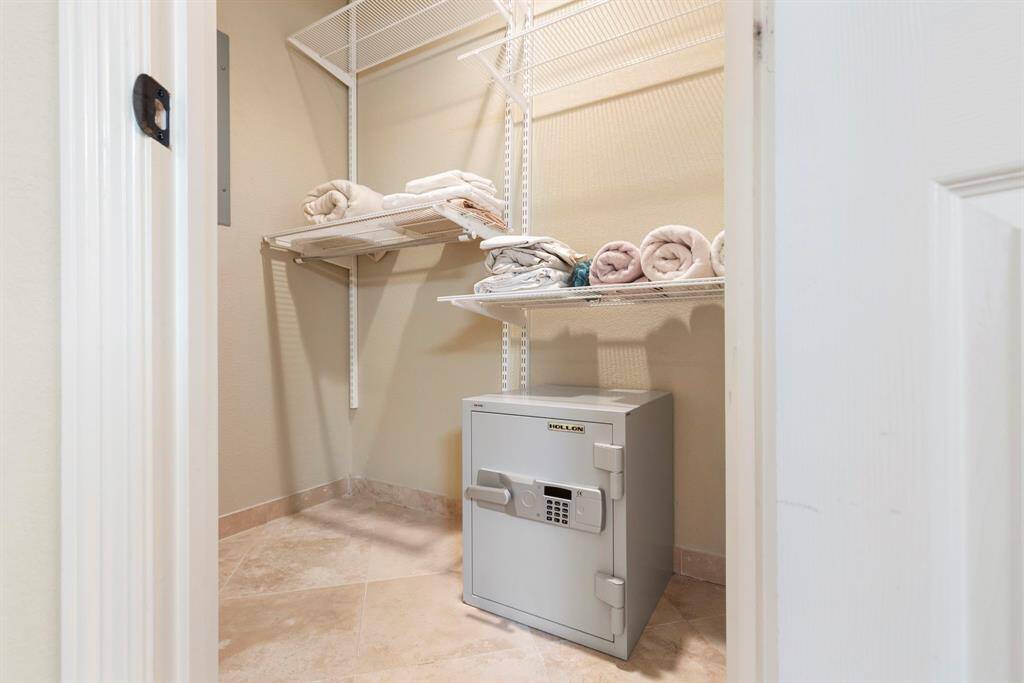 Linen closet with built in safe